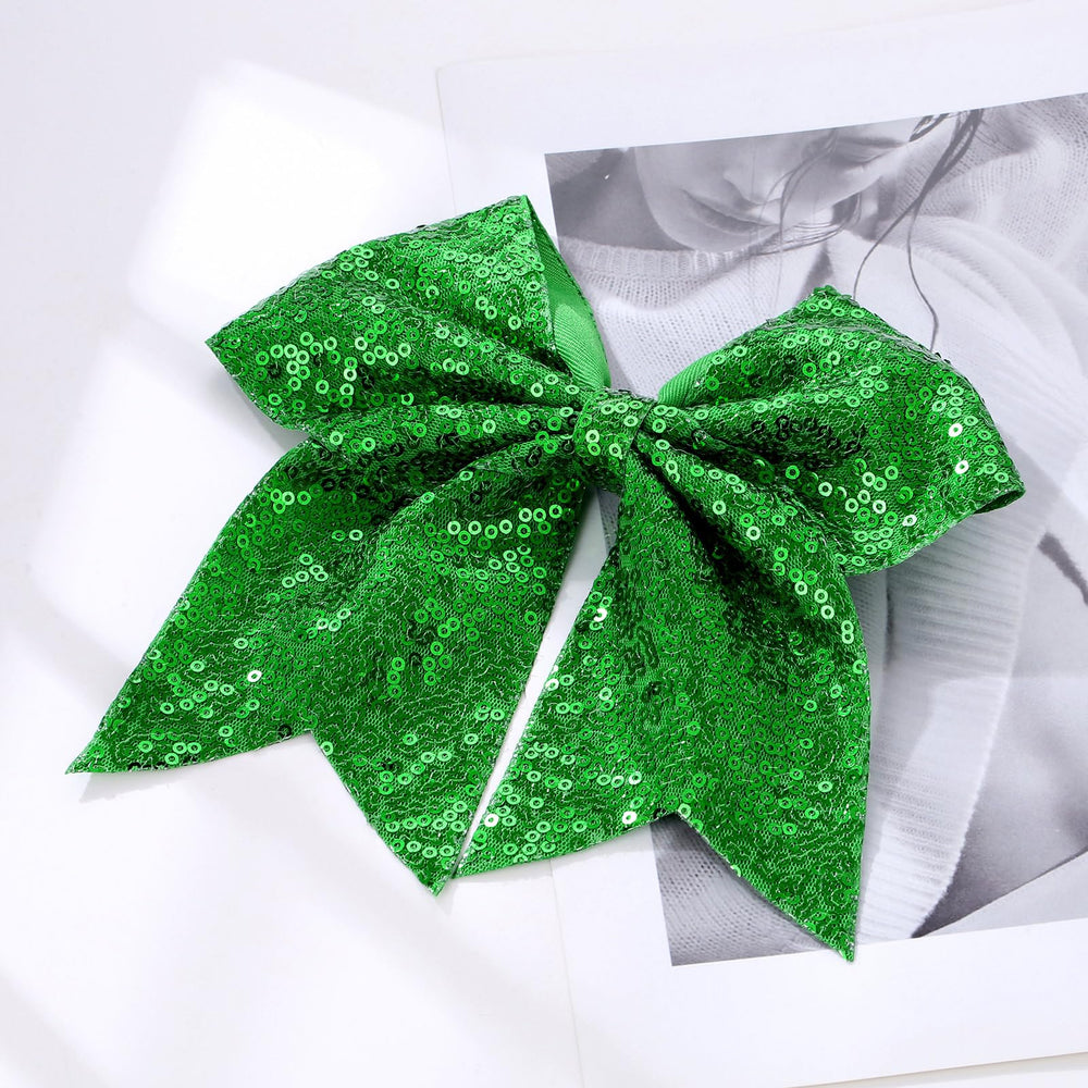 Zolyco cheer bow 7in on bun demonstrates secure, adjustable wear.