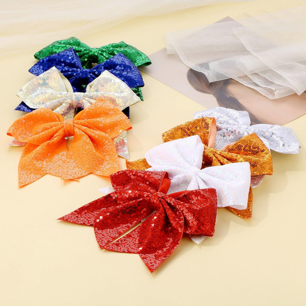 Zolyco large glitter cheer bow decorates Christmas trees with sparkle.