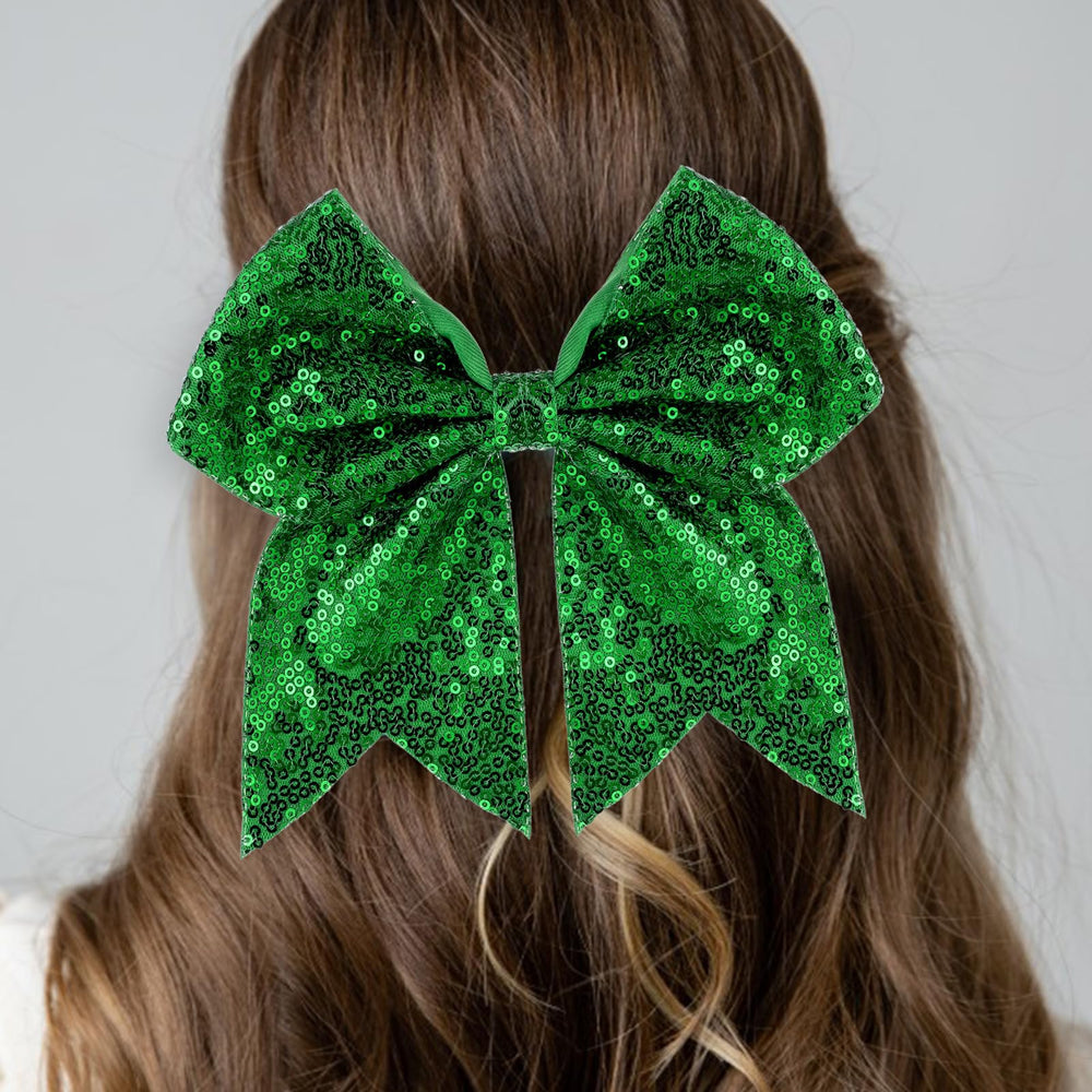Zolyco green sequin bow close-up highlighting lightweight comfort and festive sparkle.