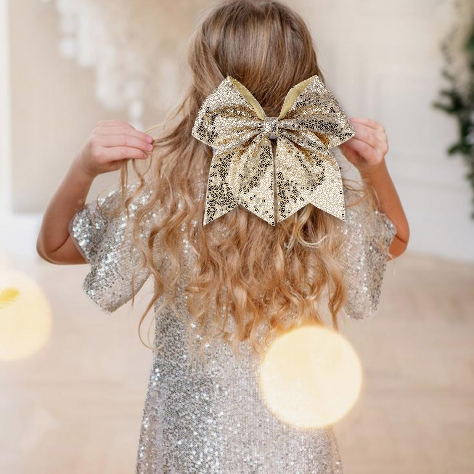 Zolyco large glitter cheer bow gold sequins closeup, sparkling detail for outfits.