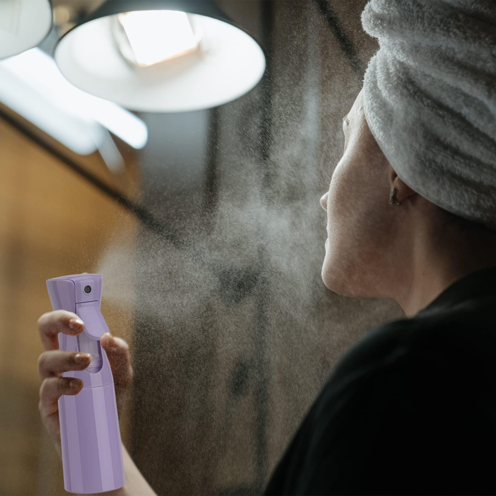 Zuhose spray bottle works for facial mist in skincare routines.