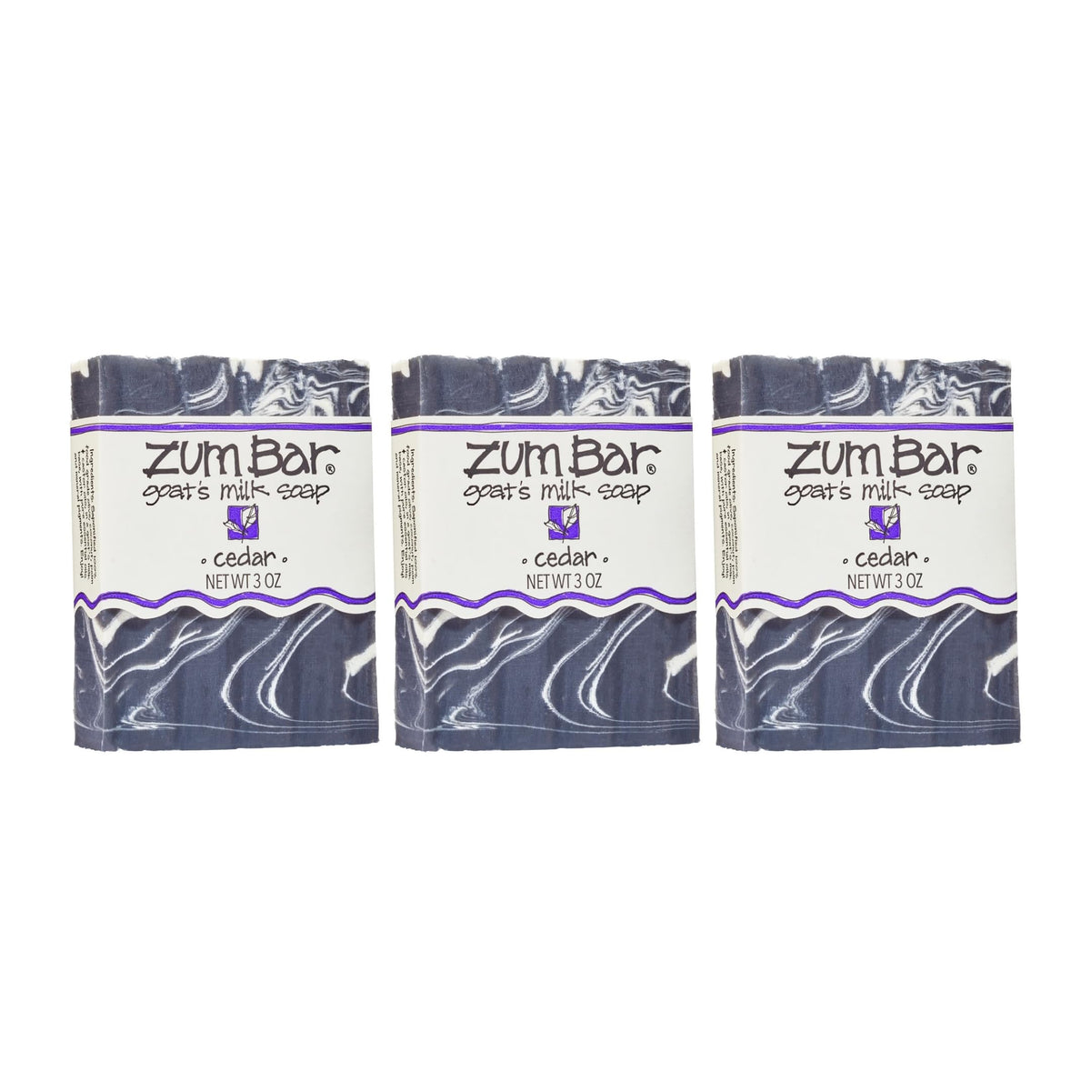 Zum Indigo Wild Goat Milk Soap Cedar closeup shows creamy lather and essential oils.
