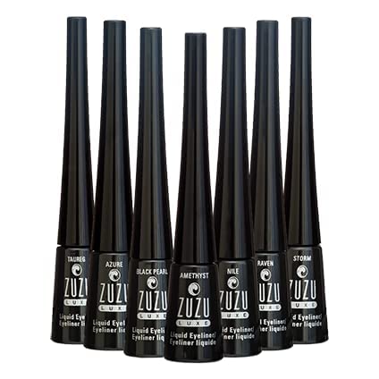 Zuzu Luxe Raven eyeliner under warm lighting shows moisture and color payoff.