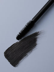 Zuzu Luxe Luxe Mascara Onyx wand in action adds length and curl
